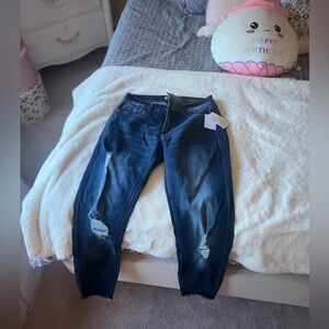 Size 2 mid wash distressed jeans